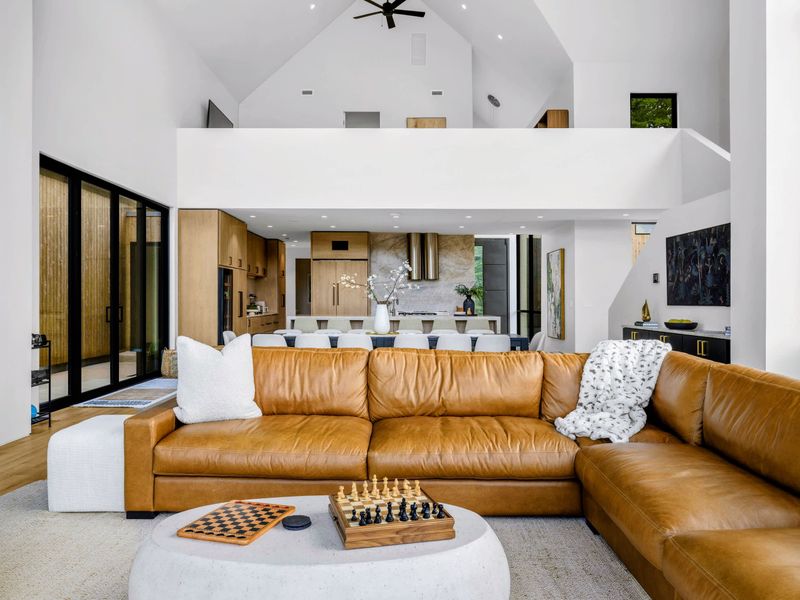 Great Room - The cantilevered living room floats toward the water, light pouring in on every side.