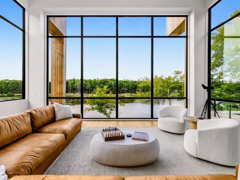 Great Room - Modern minimal design lets the landscape do the talking.