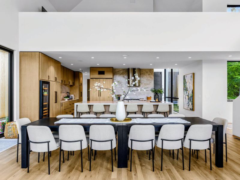 Dining Area - A table for everyone under the vaulted ceiling and pendant light.