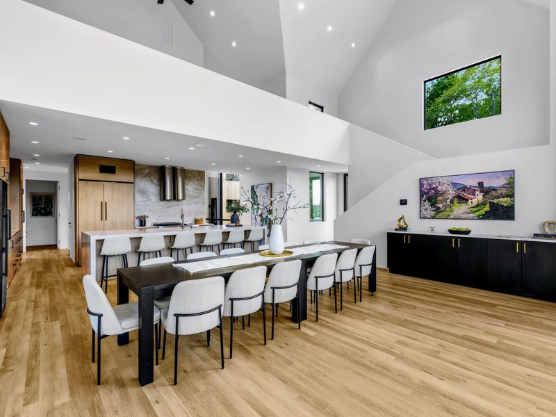 Dining Area - Bar seating and a mounted TV make this an easy spot to linger.