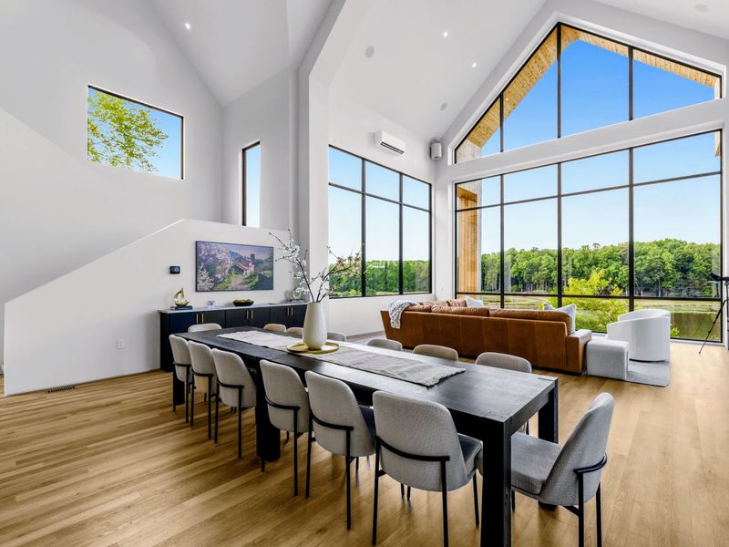 Dining Area - Dining and lounge seating gather beneath the A-frame glass.