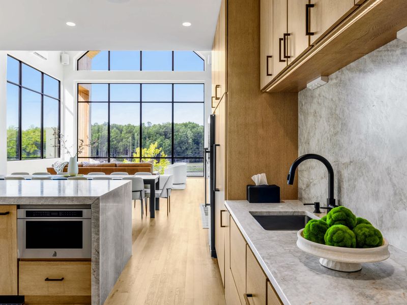 Chef's Kitchen - Prep sink, microwave drawer, and counter space that keep a full house fed.