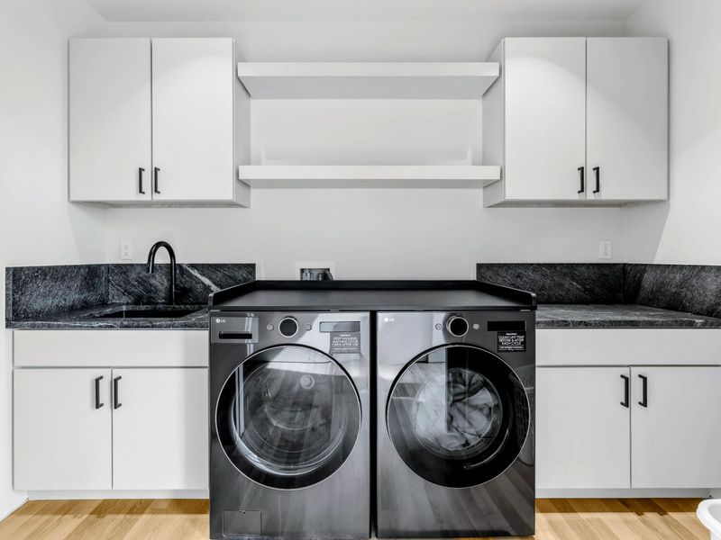 Laundry Room - Full-size washer and dryer for easy turnover after lake days.