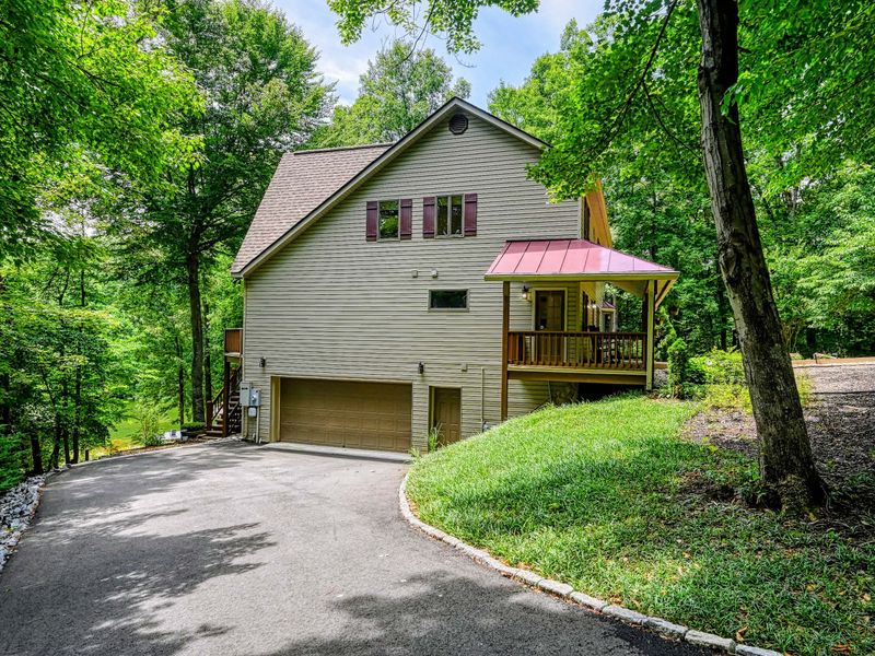 Arrival - An attached two-car garage and a circle drive offer easy, level parking for the whole group.