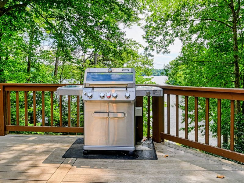 Gas Grill - A gas grill on the deck makes cookouts effortless, just steps from the kitchen.