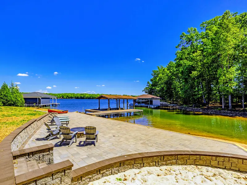 Aerial View - Tortuga Bay from above: private shoreline, sandy beach, and the dock just steps from the lawn.