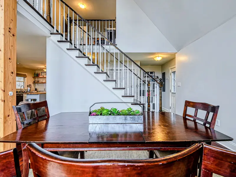 Dining Area - Gather for meals with the vaulted ceiling overhead and the outdoors all around.