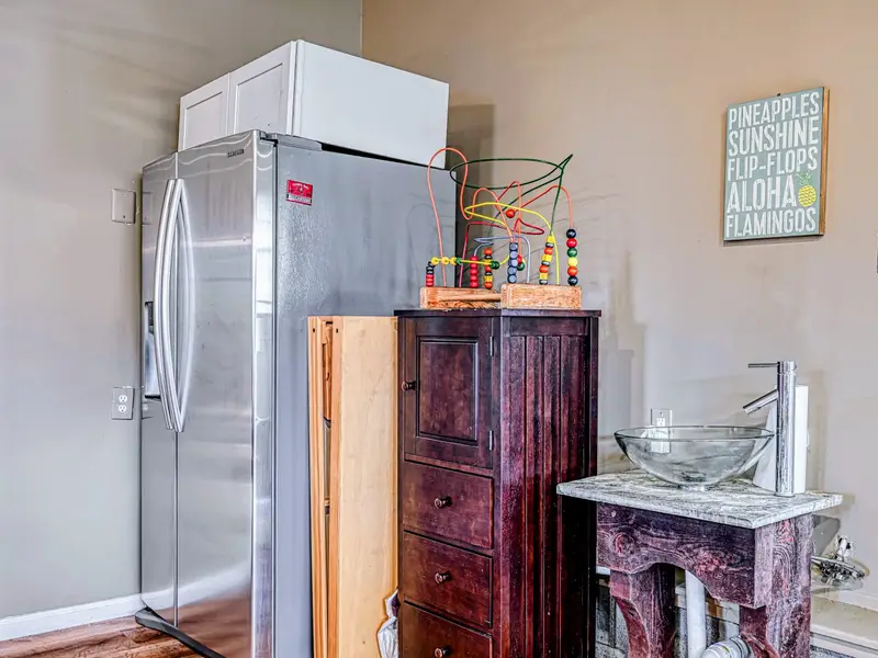 Game Room - Extra fridge and storage keep drinks and snacks close to the fun.
