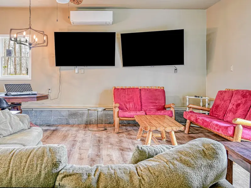 Game Room - Casual seating and games make this the home's after-hours hangout.
