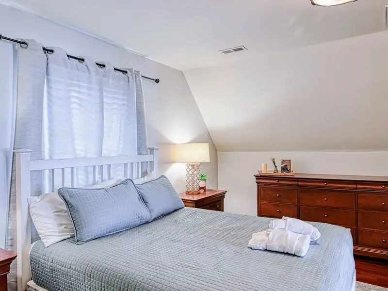 Primary Suite - Comfortable and serene, a true escape after a day on the lake.
