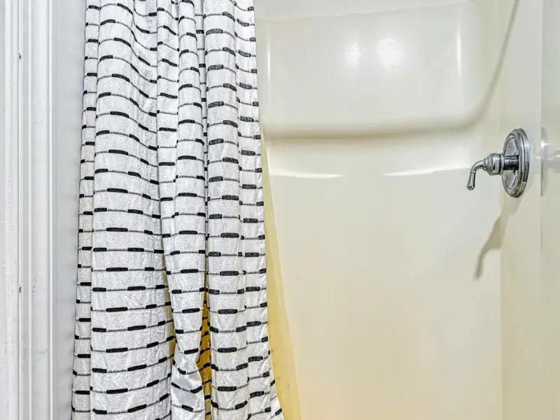 Guest Suite - A walk-in shower rounds out the suite's private bathroom.
