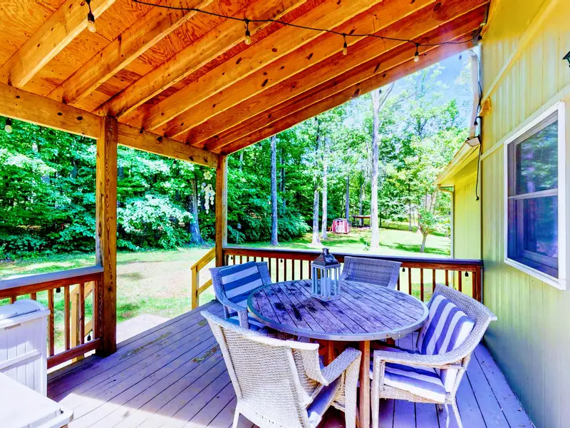 Deck - A covered deck off the kitchen keeps the gathering going rain or shine.