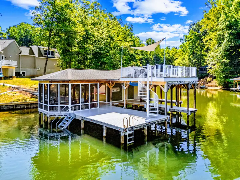 Boathouse - Two levels of lakefront lounging, with a swim platform off the dock for easy in and out all day.