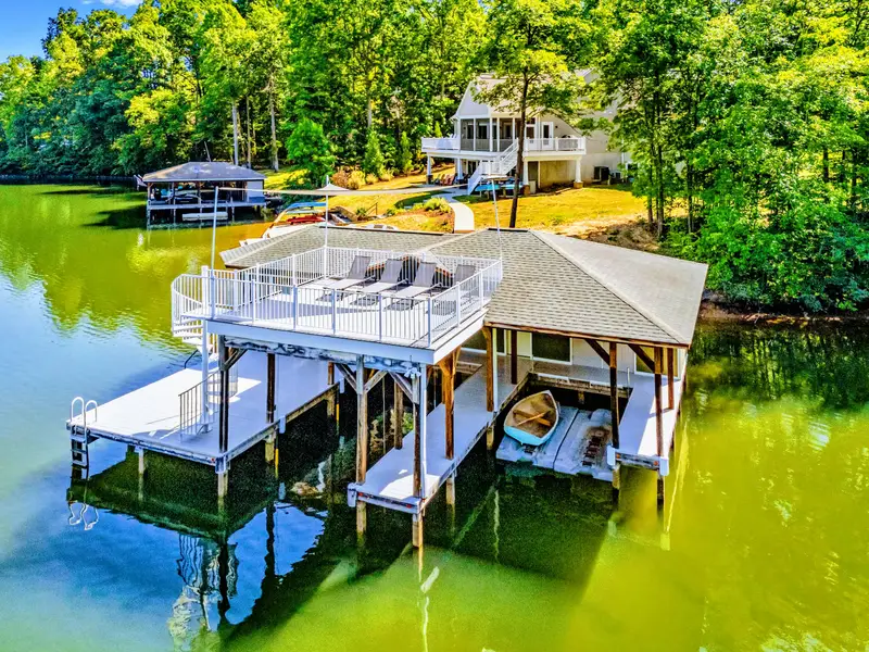 Boathouse Sun Deck - Rooftop loungers right over the water, the best seats on the property for sun, swims, and sunset.