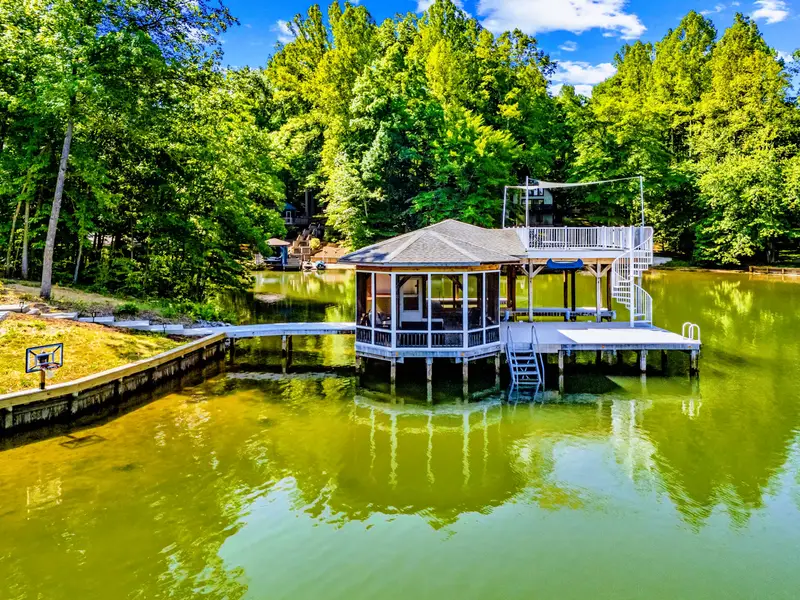 Boathouse - A screened lower level and open upper deck mean there's a spot for everyone, shade or full sun over the lake.