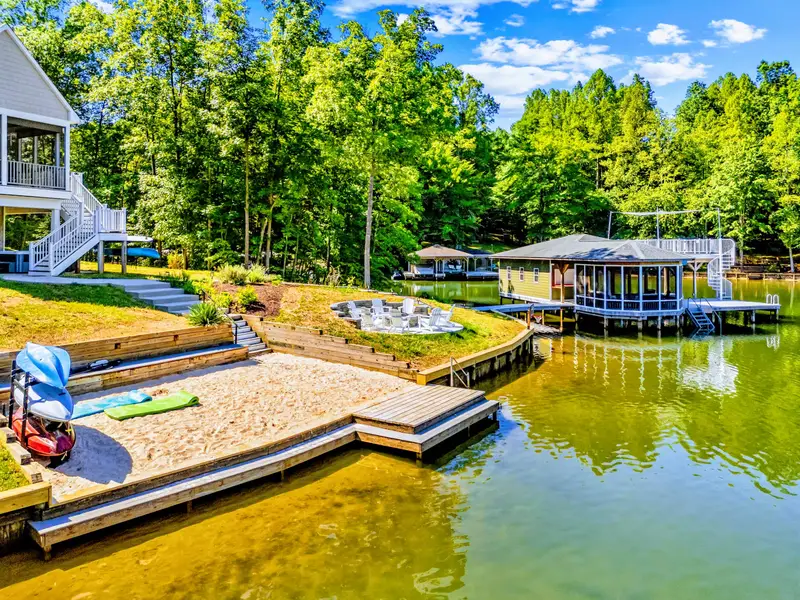 Sandy Beach - Toes in the sand, the fire pit just up the steps, and a kayak ready whenever the mood strikes.