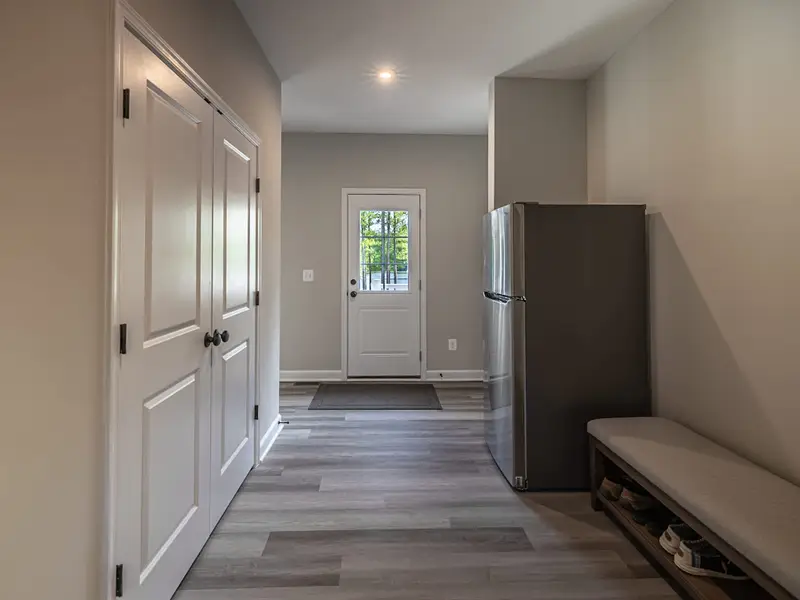 Hallway - A bright pass-through with an extra refrigerator, handy for a big group.