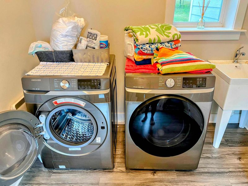 Mudroom with Washer and Dryer on the main level next to the garage.