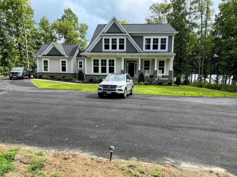 Massive parking area in front of the home.