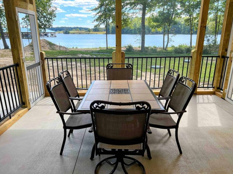 Screened in porch area allows you to enjoy the outdoors and avoid the bugs!