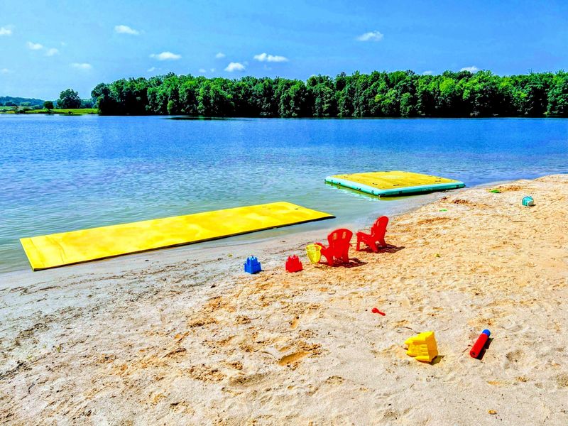 120 Foot Private Beach! You will love the 160+ feet of lakefront shoreline with a gently sloped naturally sandy lake bottom, and warm freshwater.
