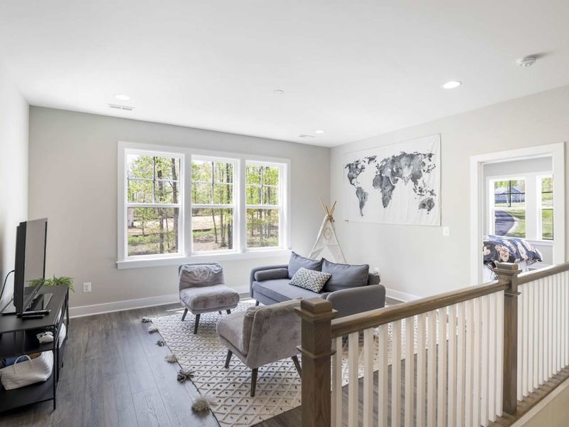 Upstairs secondary living area with TV and Xbox.