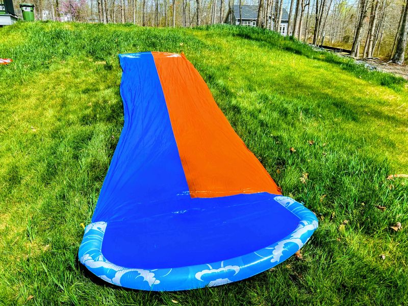 Get ready for nonstop fun with this thrilling backyard water slide! Perfect for kids and adults alike, race down the hill and cool off on warm days. A great way to add excitement and laughter to your lakefront getaway. Let the sliding adventures begi