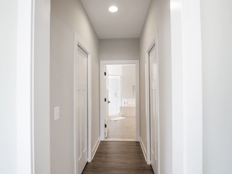 Primary Suite on the main level with dual walk-in closets and a huge bathroom!
