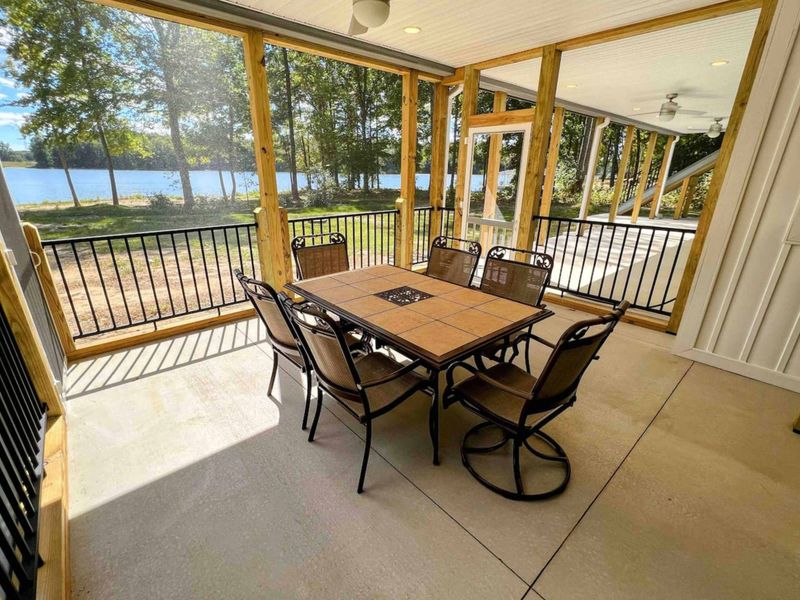 Screened in porch area allows you to enjoy the outdoors and avoid the bugs!