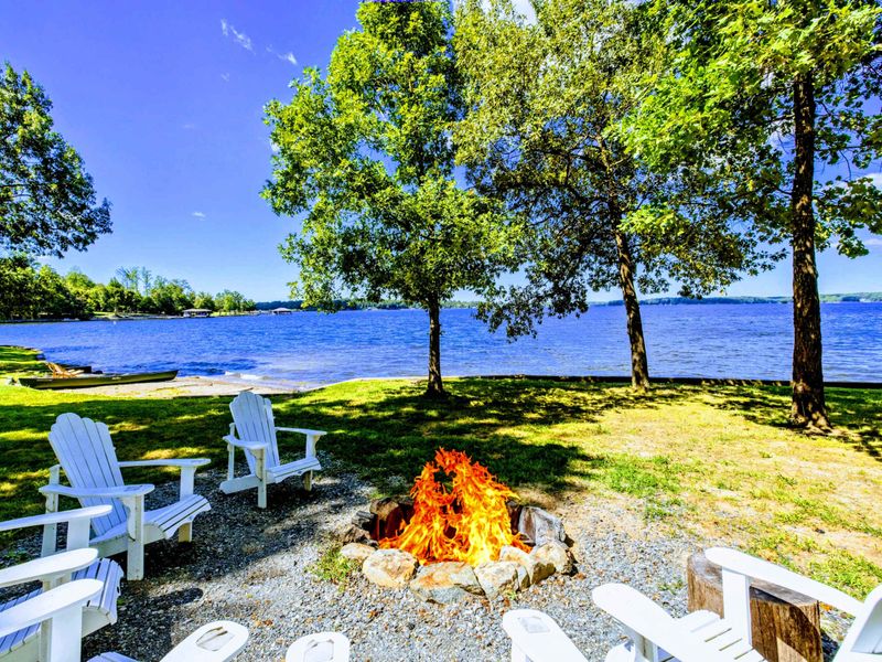 Enjoy the breathtaking views of the lake during the day and the firepit for when it gets dark.