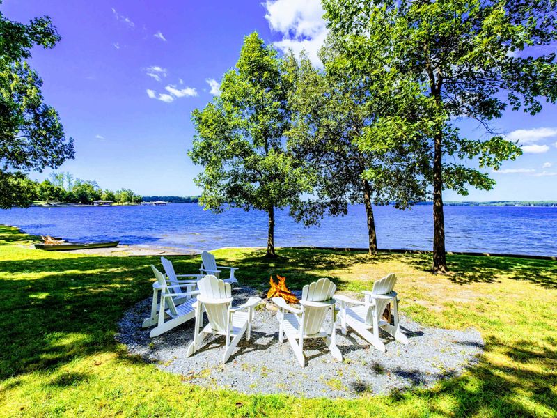 Enjoy the breathtaking views of the lake during the day and the firepit for when it gets dark.