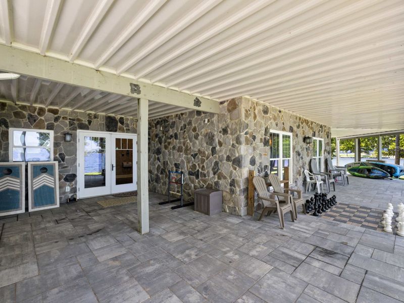 Enjoy the best of outdoor gaming as you indulge in corn hole and ladder toss by the serene lakeside.
