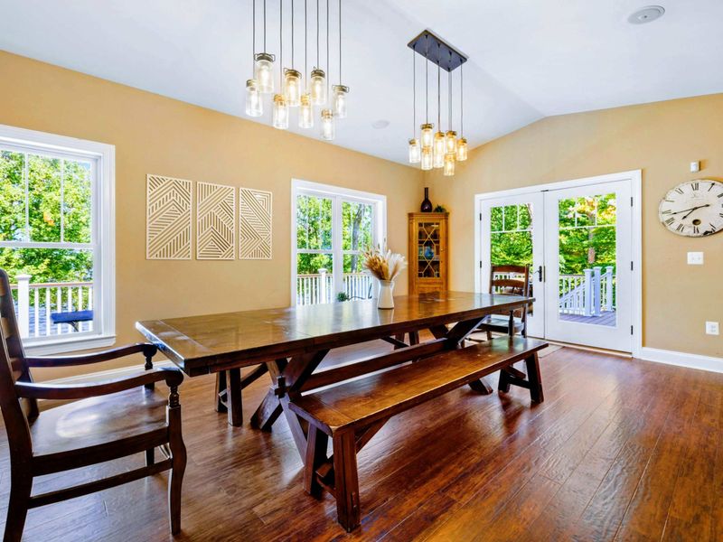 Savor culinary delights while feasting your eyes on stunning lake views in our spacious dining room, perfectly set for 10.