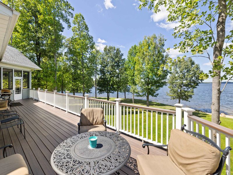 Unwind in style on our deck adorned with plush, comfortable chairs, where every seat is a front-row view to the breathtaking lake.