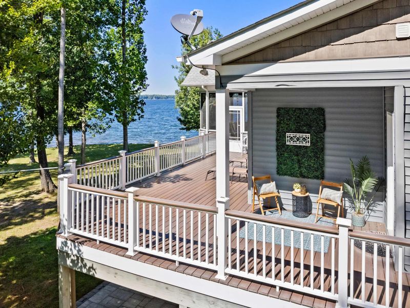 Experience ultimate lakeside luxury as you settle into our deck's inviting, cozy chairs.