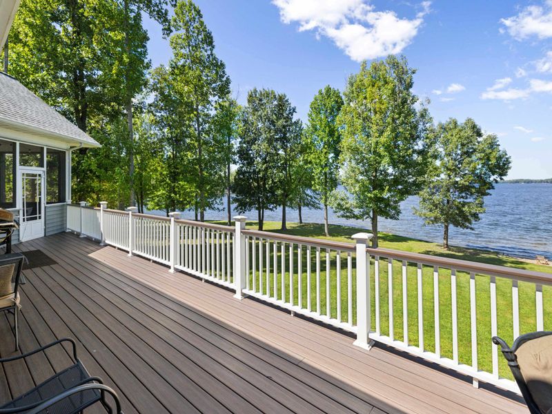 Unwind in style on our deck adorned with plush, comfortable chairs, where every seat is a front-row view to the breathtaking lake.