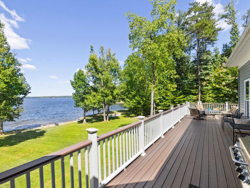 Unwind in style on our deck adorned with plush, comfortable chairs, where every seat is a front-row view to the breathtaking lake.