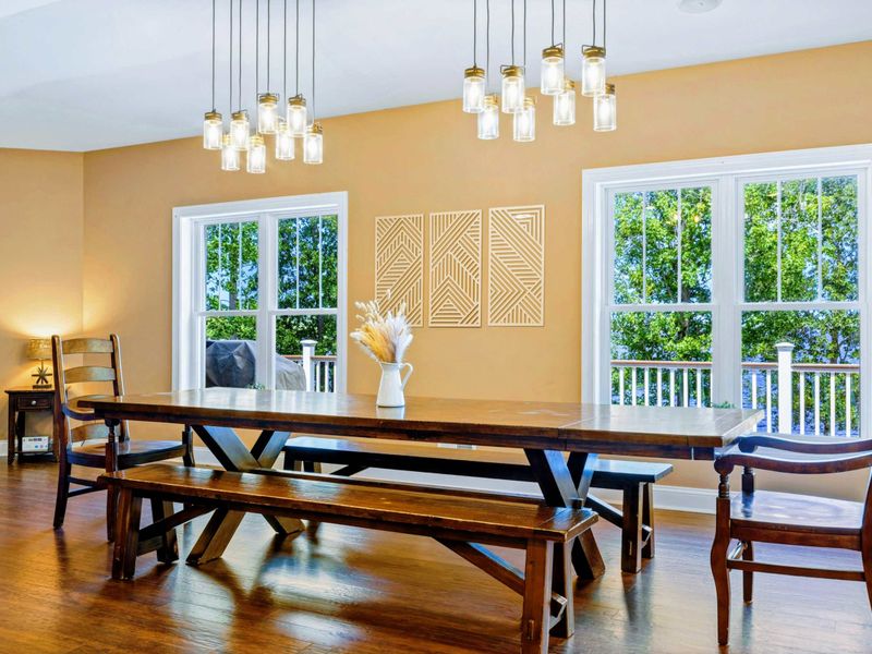 Savor culinary delights while feasting your eyes on stunning lake views in our spacious dining room, perfectly set for 10.