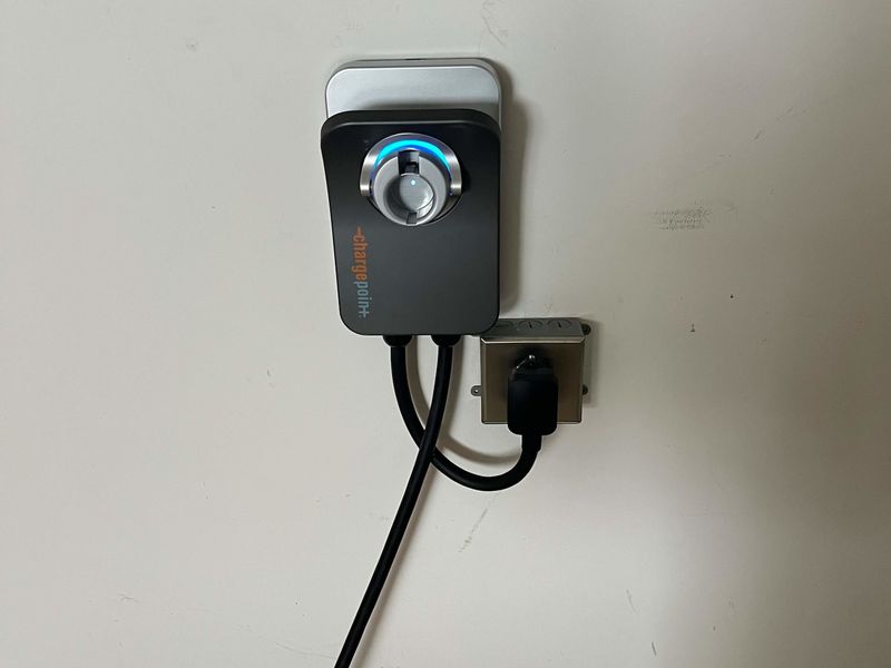 EV Charger - A wall-mounted ChargePoint station in the garage for guests who drive electric.