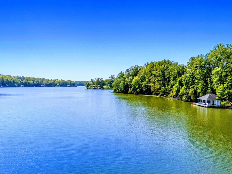 Lake View - Wide-open water and wooded shoreline stretch out from the property's private cove.