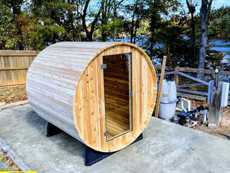 Barrel Sauna - A cedar barrel sauna on a concrete pad, steps from the lake, for the ultimate post-swim warm-up.