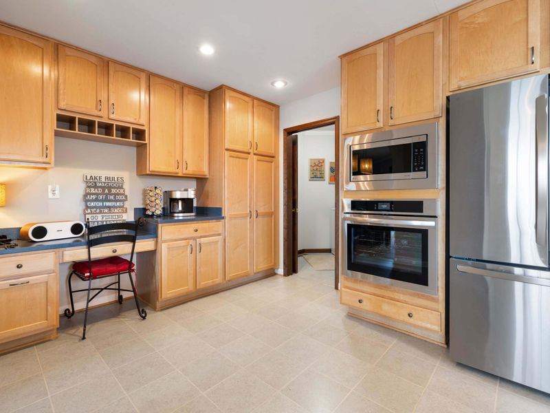A fully-equipped kitchen with stainless steel appliances