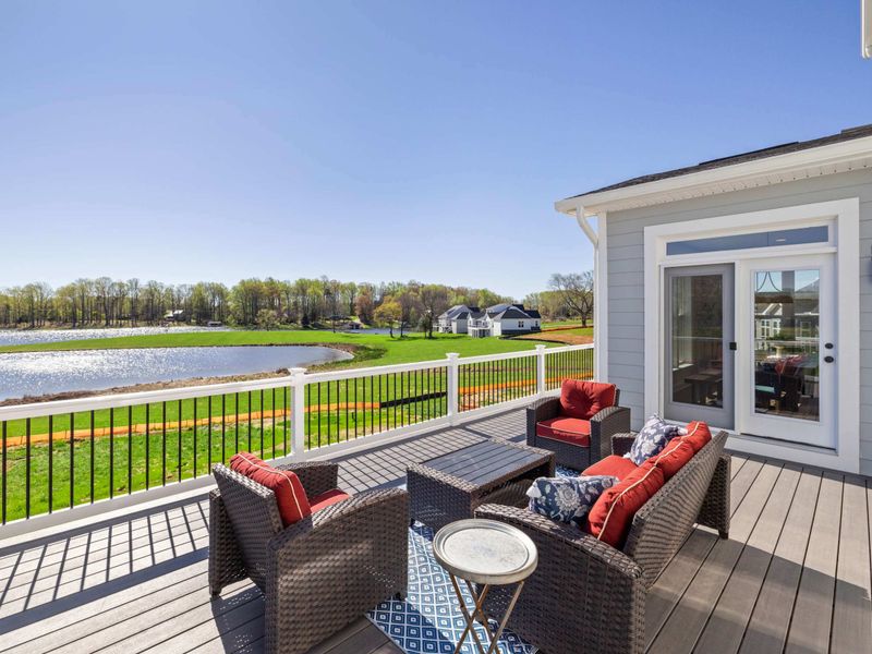 Patio - A covered side deck with outdoor seating, an easy spot to settle in out of the sun but still in the breeze.