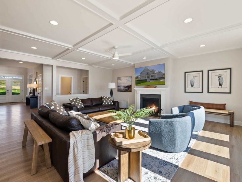 Great Room - Another angle of the main living room, showing how the sectionals flow toward the lake-facing windows.