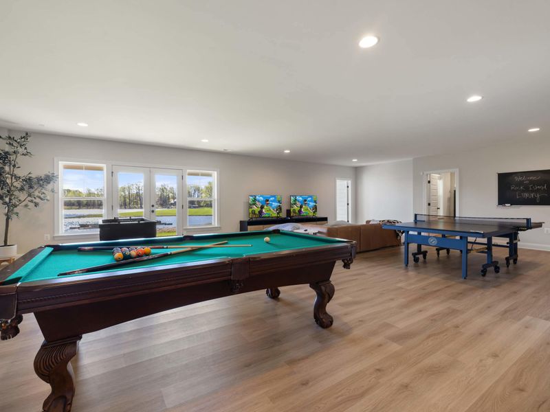 Game Room - Another angle of the game room, the pool table front and center with plenty of walk-around space on every side.