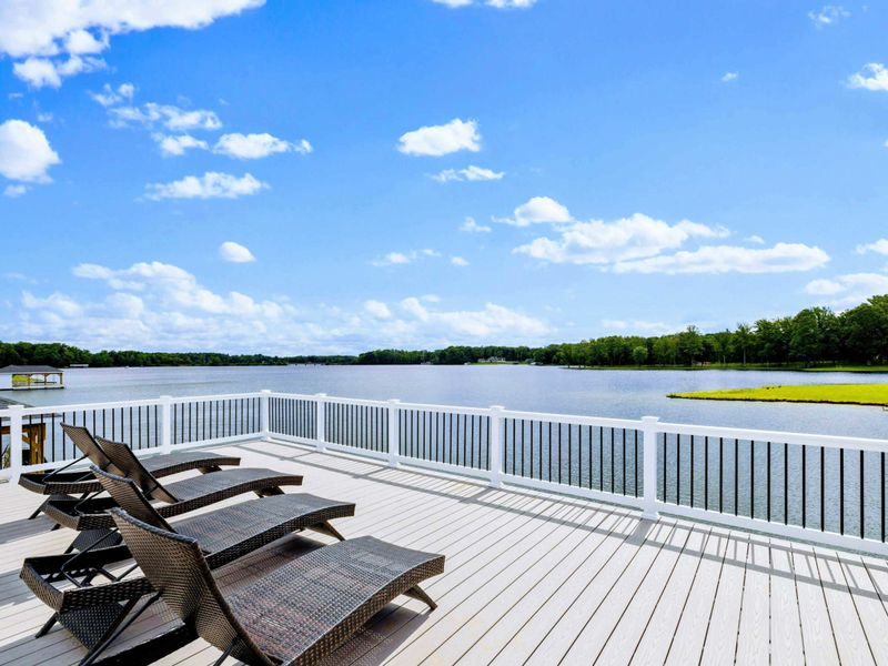 Backyard - The dock from the water: boat lift, jet ski ports, and easy access whenever you're ready to launch.