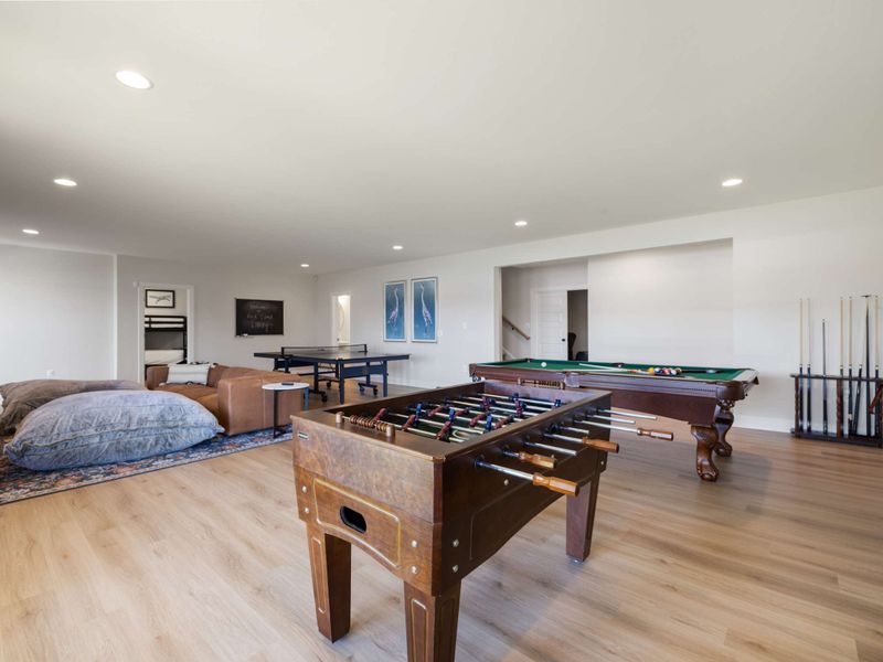 Game Room - Pool table, foosball, ping pong, and a lounge area, all in one wide open space built for hanging out.