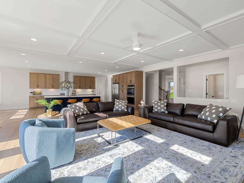 Great Room - Across the great room toward the dining area, an easy flow from sofa to table to kitchen.