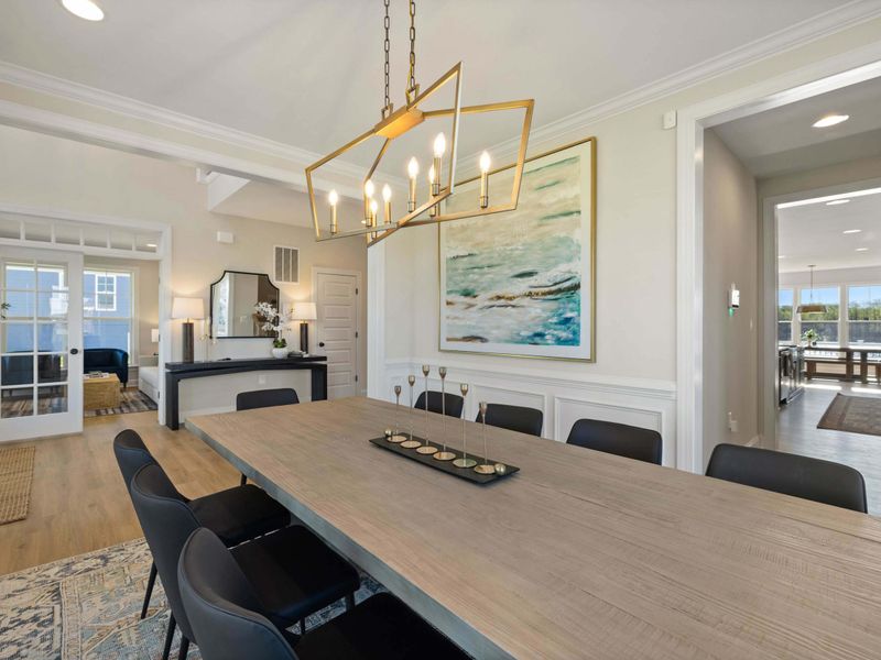 Formal Dining Room - Looking through the dining room toward the kitchen, a layout that keeps the host connected to the group.