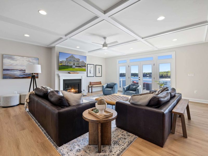 Great Room - Two long sectionals face the fireplace and the view, with space for everyone to land at the end of the day.